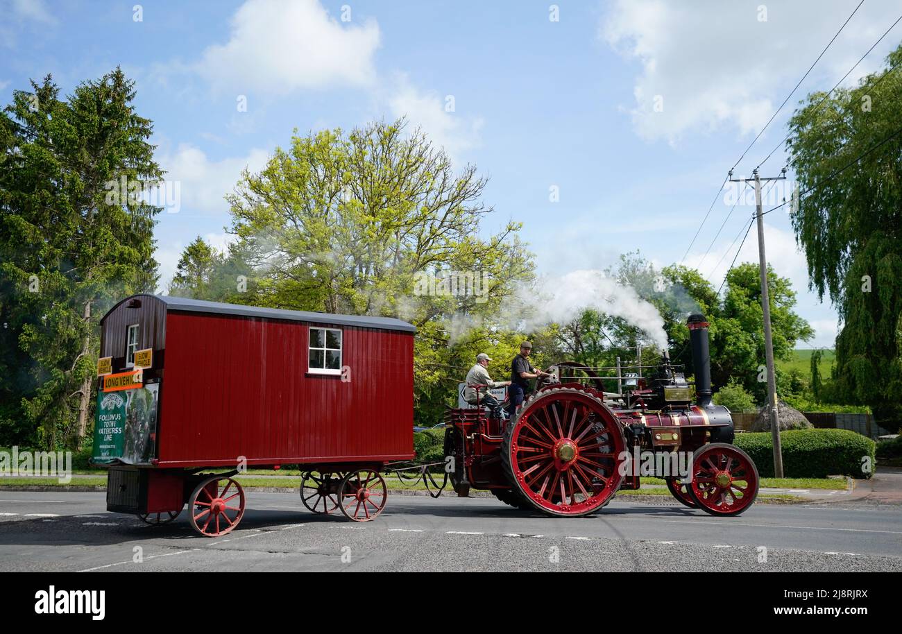 The Foden General Purpose Engine 3384, 'Wattie Pollock' makes it's way onto the A3057 near Kimbridge in Hampshire, as it travels to the Mid Hants Railway, also known as the Watercress Line, to take part in their Vintage Vehicles weekend which runs from 20-22 May. Stock Photo