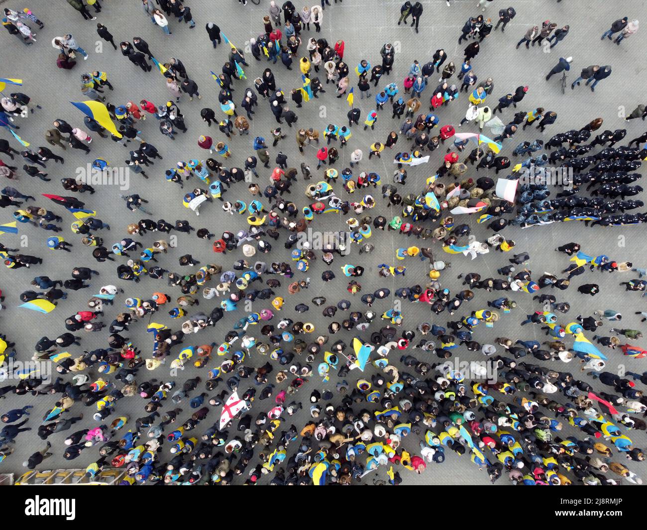 Odessa, Ukraine. 20th Feb, 2022. EDITOR'S NOTE : Image taken with drone.A large crowd of people holding Ukrainian flags is seen near the monument to Duke de Richelieu. Mass meetings in Odessa before the Russian-Ukrainian war. (Photo by Viacheslav Onyshchenko/SOPA Images/Sipa USA) Credit: Sipa USA/Alamy Live News Stock Photo