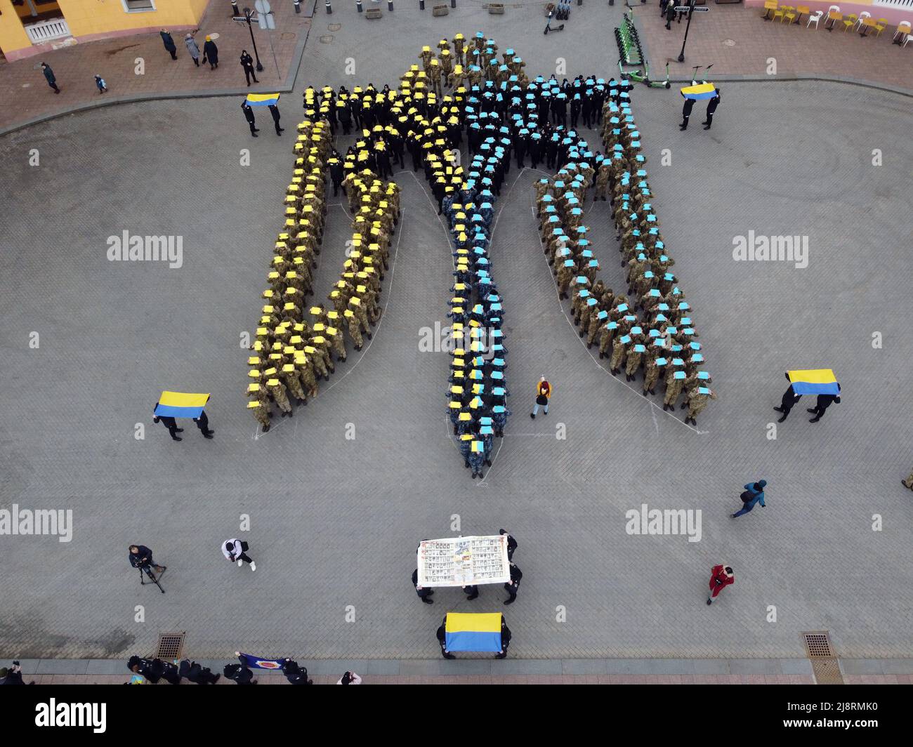 Odessa, Ukraine. 19th Feb, 2022. EDITOR'S NOTE : Image taken with drone.A large crowd of people lined up in a huge trident of Ukraine with Ukrainian flags. Mass meetings in Odessa before the Russian-Ukrainian war. (Photo by Viacheslav Onyshchenko/SOPA Images/Sipa USA) Credit: Sipa USA/Alamy Live News Stock Photo