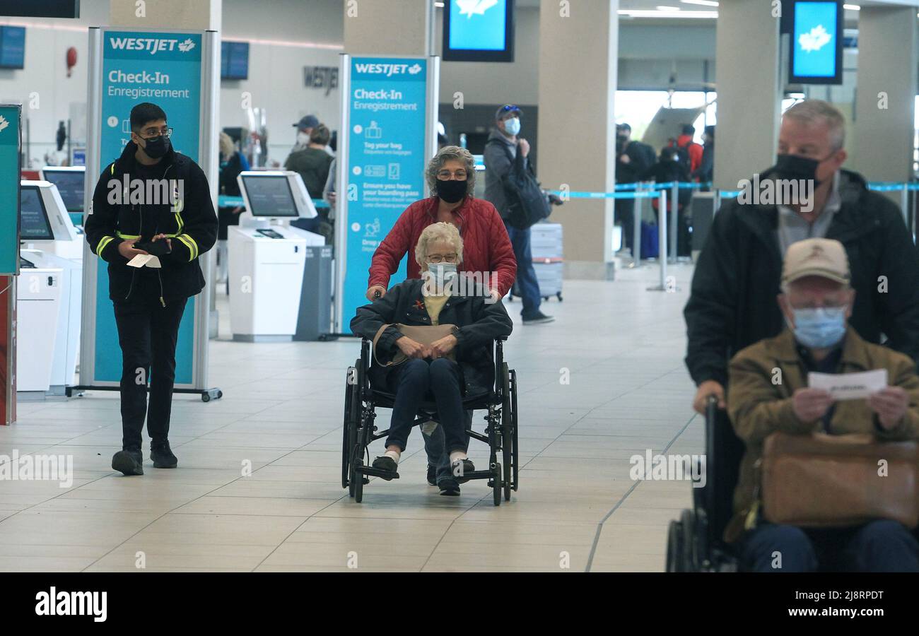 Calgary, Alberta, Canada May 17 2022 Travelers at with luggage