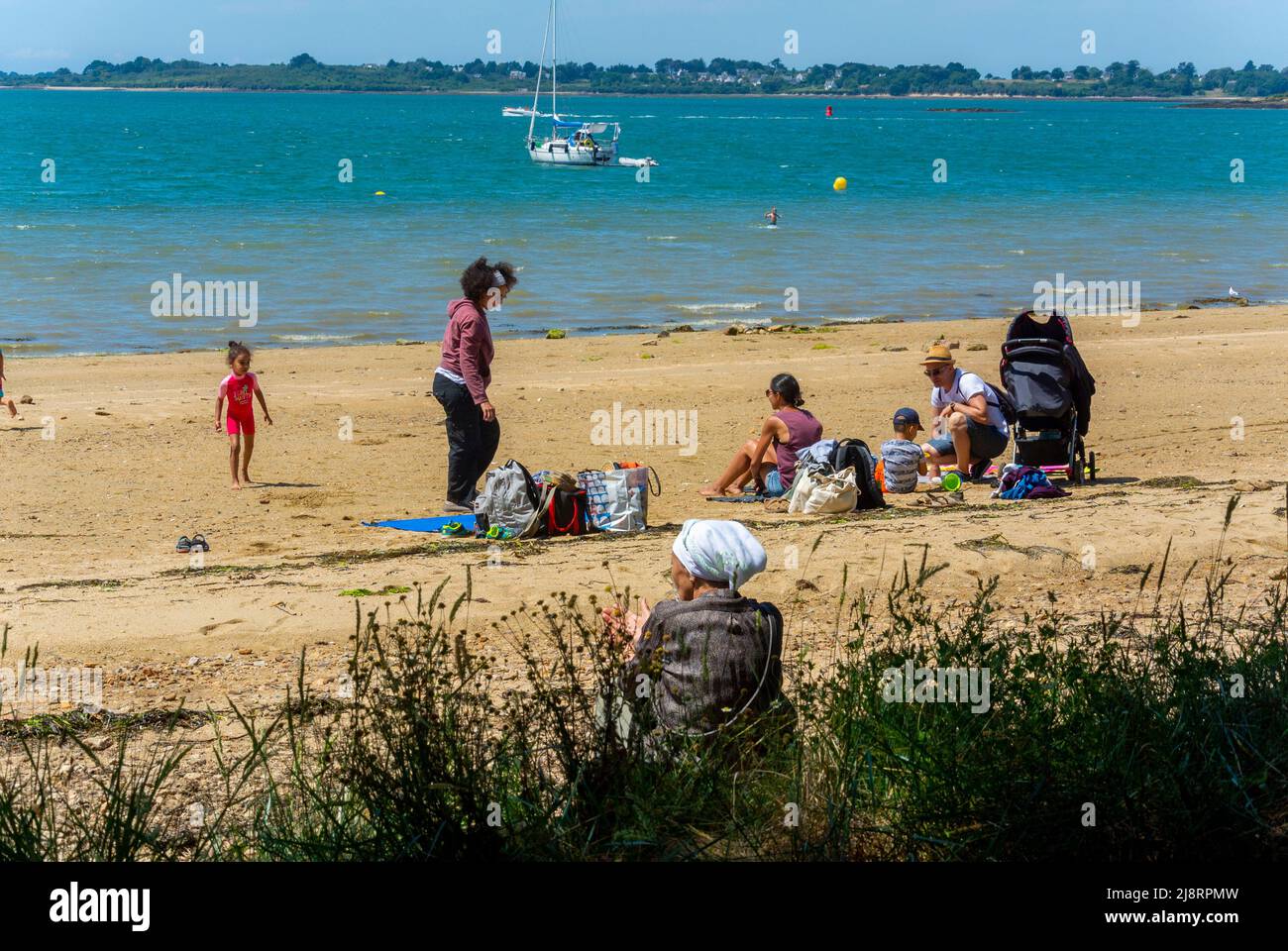 Ile d'Arz, France, Brittany, Group People, multigenerational family TOurists on Beach, Group of multicultural kids Stock Photo