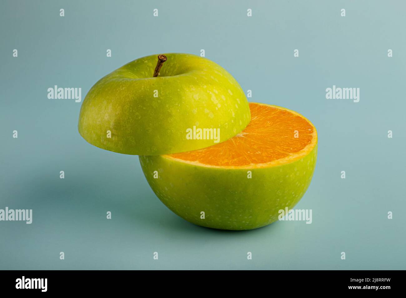 Surrealism Apple and Orange Stock Photo