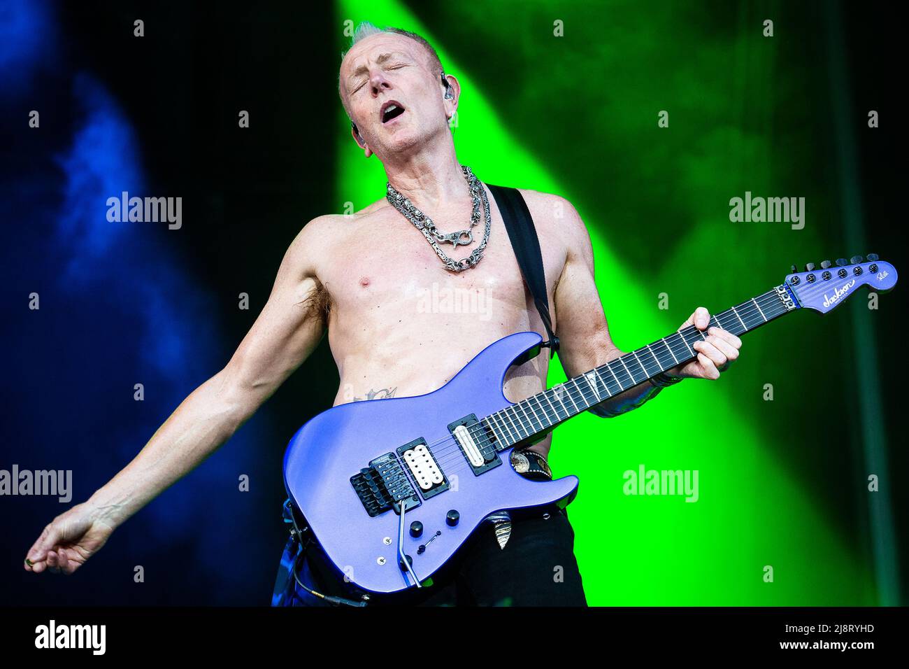 Phil Collen of Def Leppard performing live on stage Stock Photo