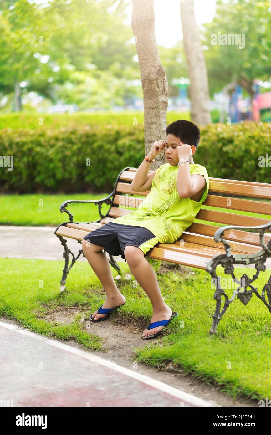 Hurt boy on playground hi-res stock photography and images - Alamy