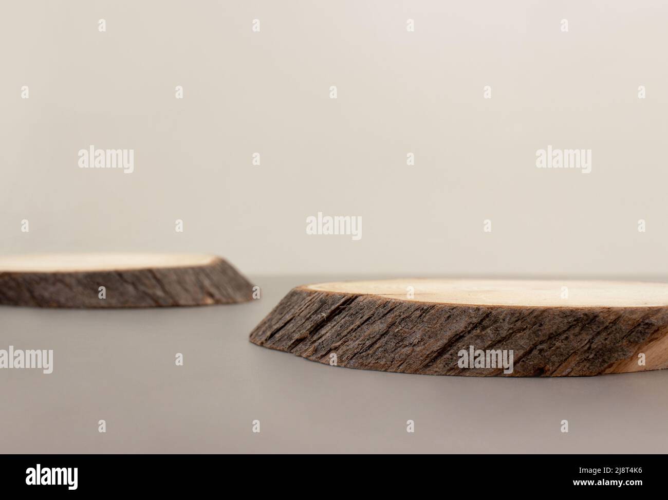 empty piece of wood podium minimalism on beige background. Copy space, place for text, banner Stock Photo