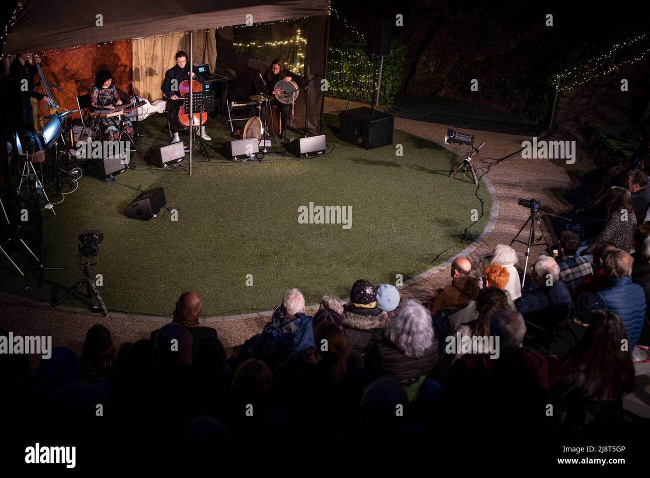 Maya Youssef and ensemble performing at Trebah Garden Amphitheatre in Cornwall in the UK. Stock Photo