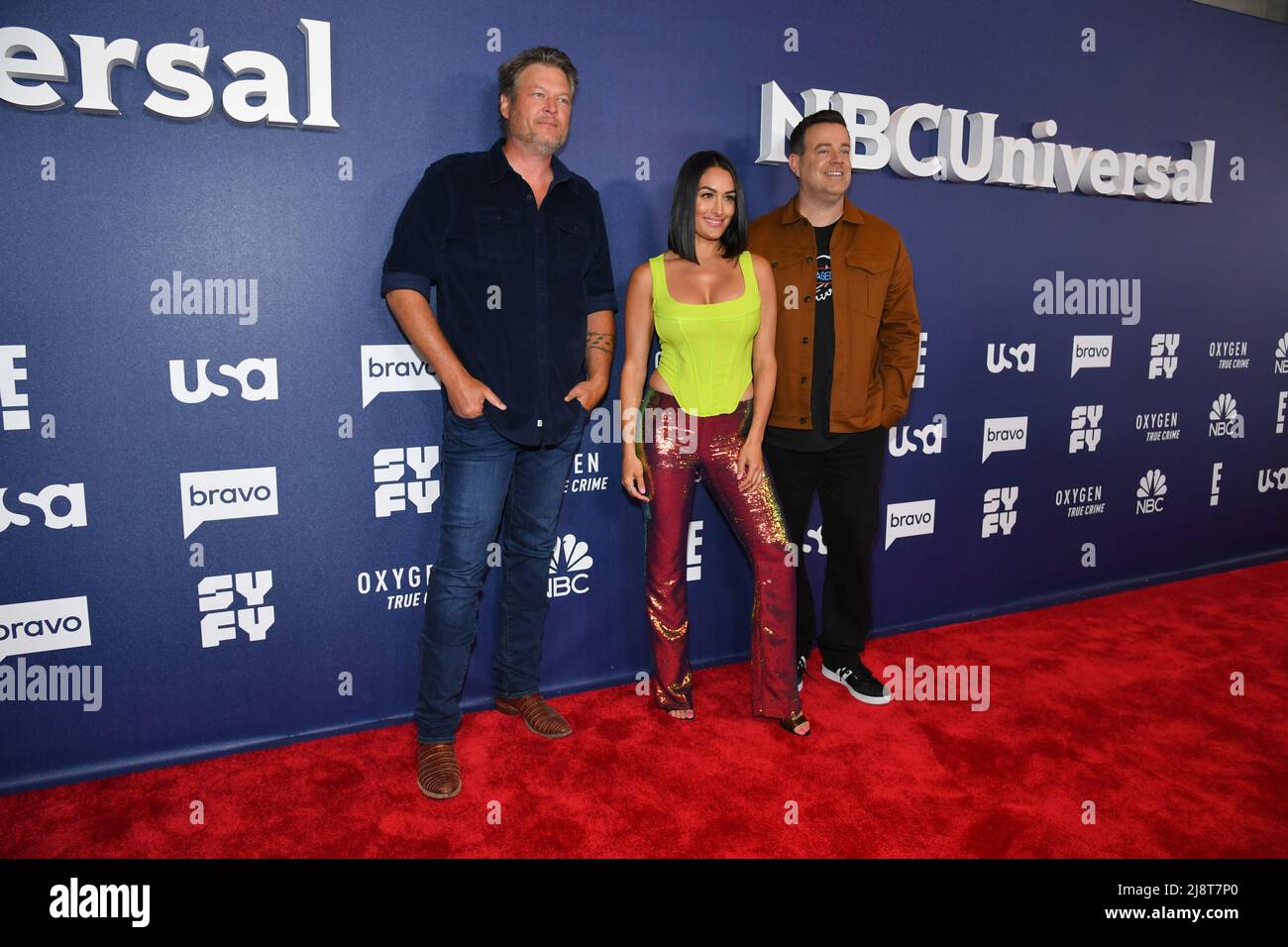 Blake Shelton, from left, Nikki Bella and Carson Daly attend NBCUniversal's  2022 Upfront press junket at the Mandarin Oriental Hotel on Monday, May 16,  2022, in New York. (Photo by Evan Agostini/Invision/AP