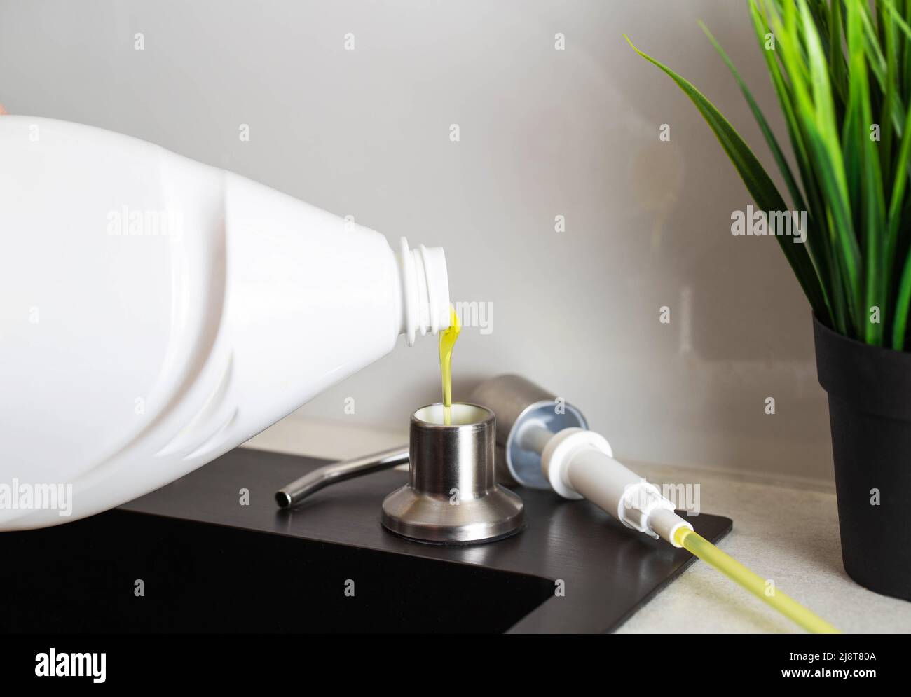 adding soap dispenser to kitchen sink