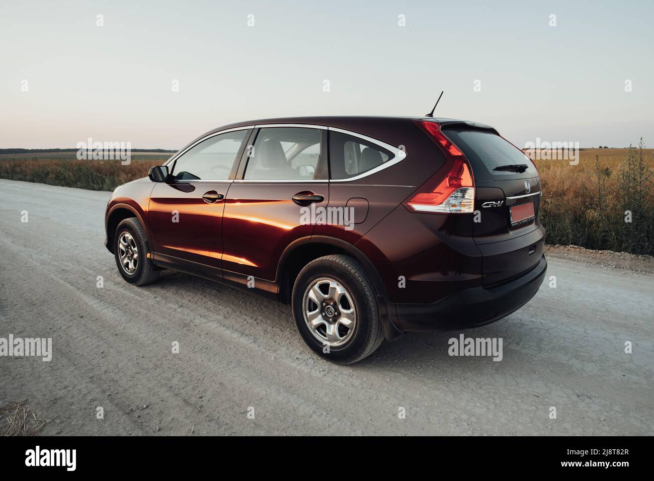 TERNOPIL, Ukraine - July 21 2021: Back View of Honda CR-V on the Country Road Stock Photo