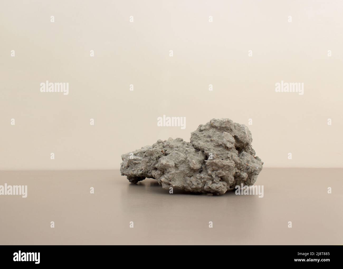 empty nature rough stone podium minimalism on light beige background. Copy space, place for text Stock Photo