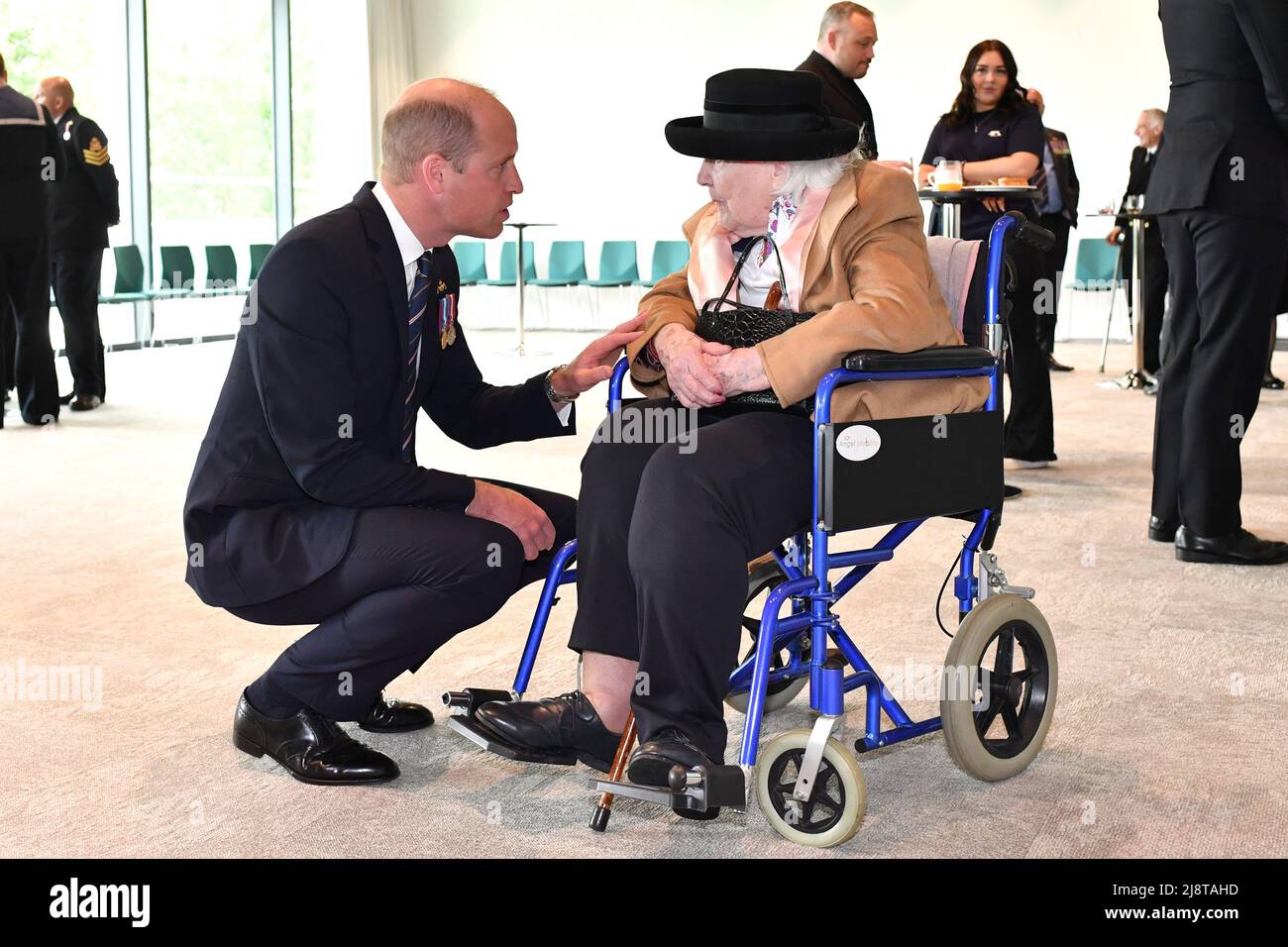 The Duke of Cambridge speaks with 100-year-old Diana Mayes, who was widowed in 1943, during the unveiling of a submariners memorial at the National Memorial Arboretum in Staffordshire. Picture date: Wednesday May 18, 2022. Stock Photo