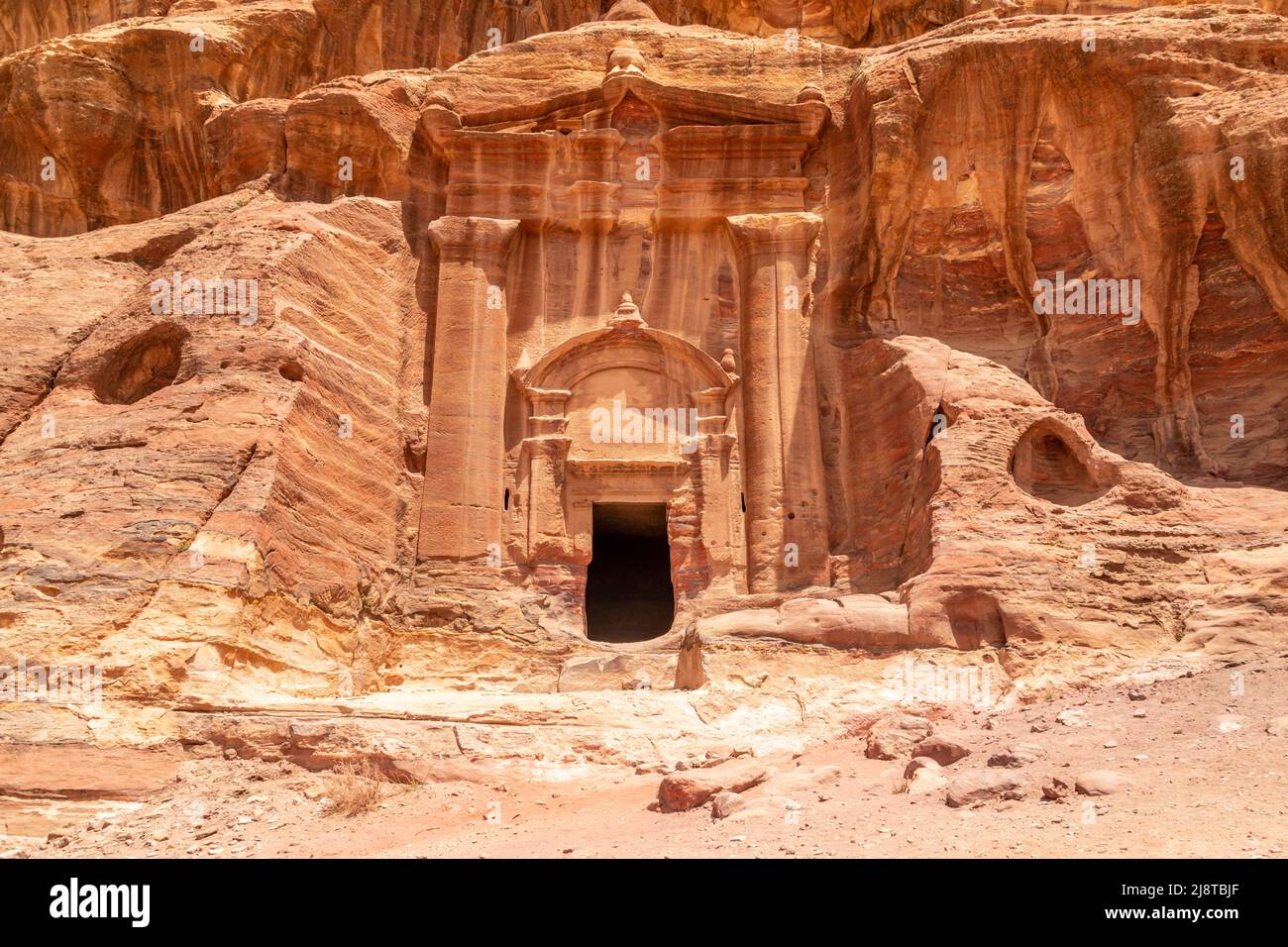 Ancient Renaissance Tomb carved in sandstone rock, Wadi Farasa canyon,  Petra, Jordan Stock Photo