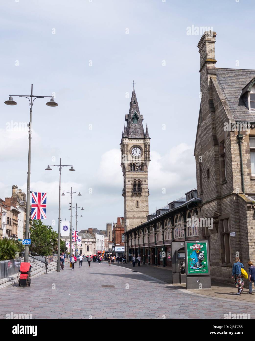 A view of the town clock and indoor market in Darlington in the north east of England Stock Photo