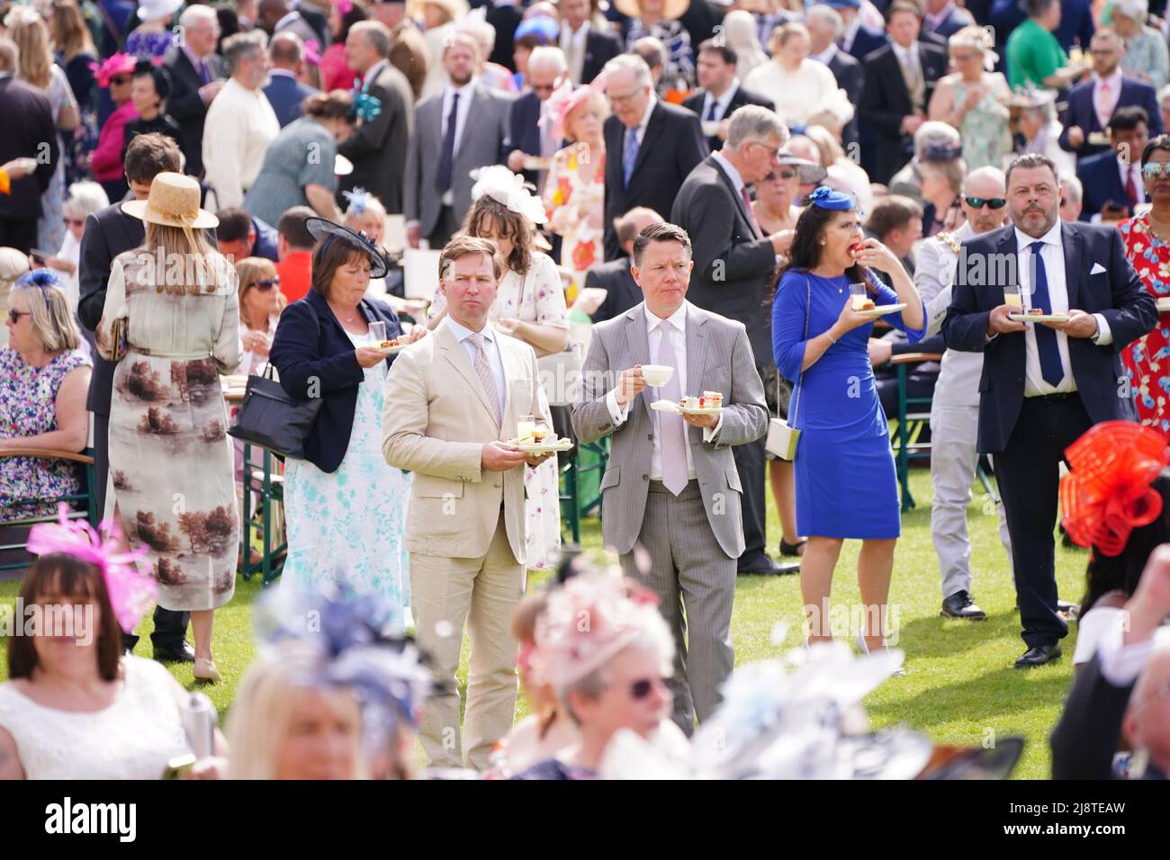 Guests attending a Royal Garden Party at Buckingham Palace in London. Picture date Wednesday