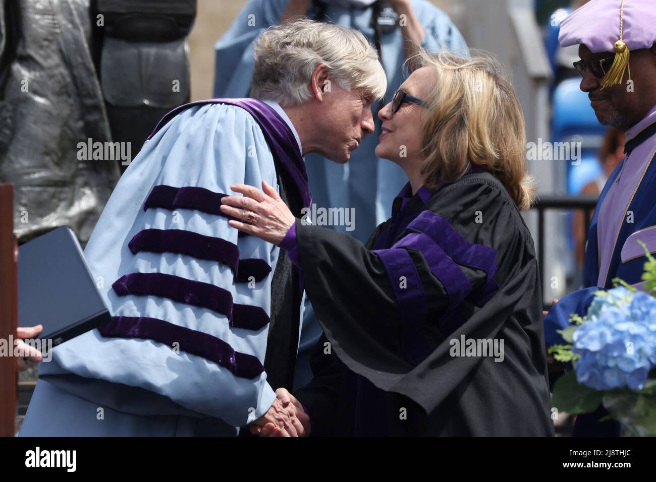 President and Seth Low Professor of Columbia University Lee C. Bollinger  congratulates former . Secretary of State Hillary Rodham Clinton as she  receives an honorary Doctor of Laws Degree during the Columbia