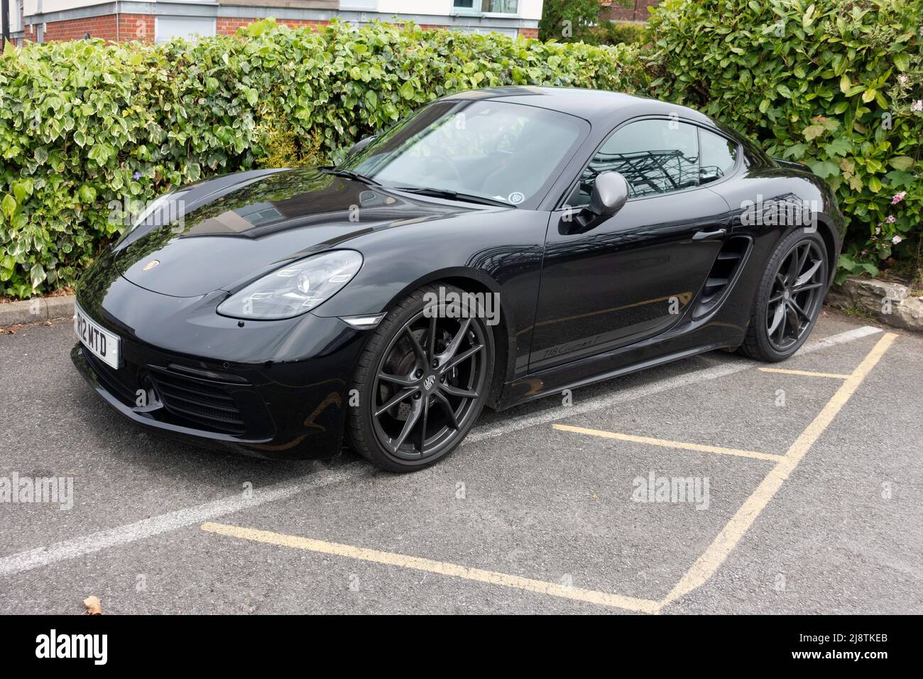 A black Porsche 718 Cayman T sports car parked in North Yorkshire Stock Photo