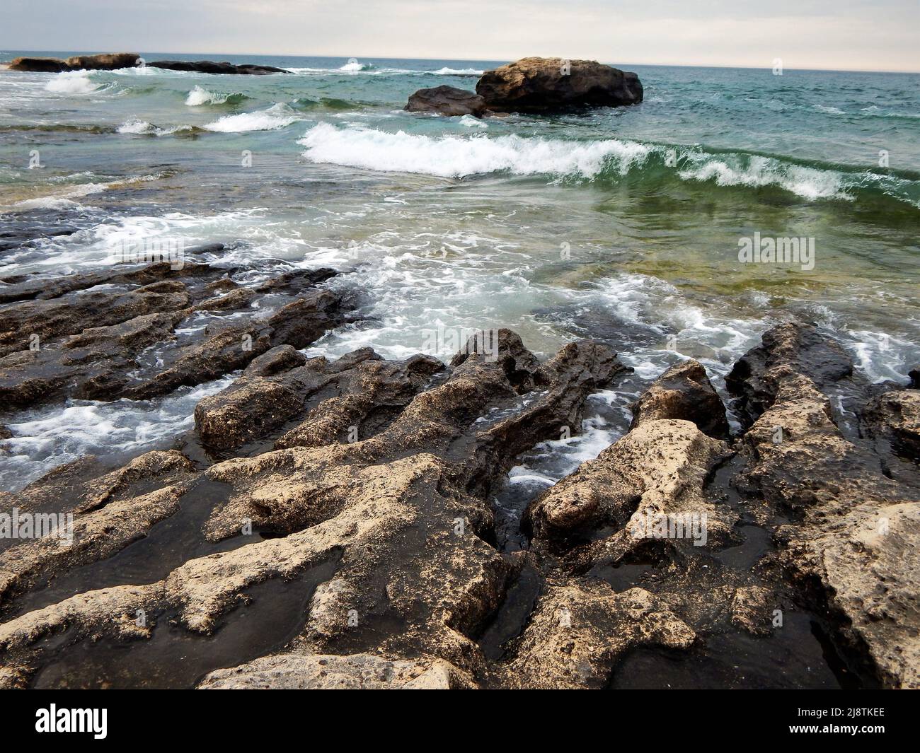Rough coast of the Caspian Sea. Kazakhstan. Mangistau region. 15 July 2020 year. Stock Photo