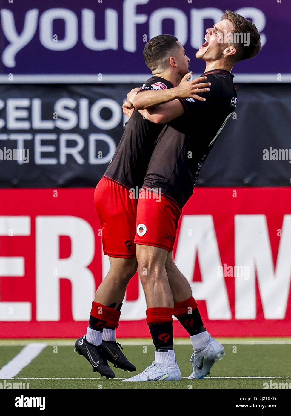 ROTTERDAM - Marouan Azarkan of sbv Excelsior and Thijs Dallinga of sbv Excelsior celebrate the 1-0 during the Dutch play-offs promotion/relegation match between Excelsior and Heracles Almelo at the Van Donge & De Roo stadium on May 18, 2022 in Rotterdam, Netherlands. ANP PIETER STAM DE YOUNG Stock Photo