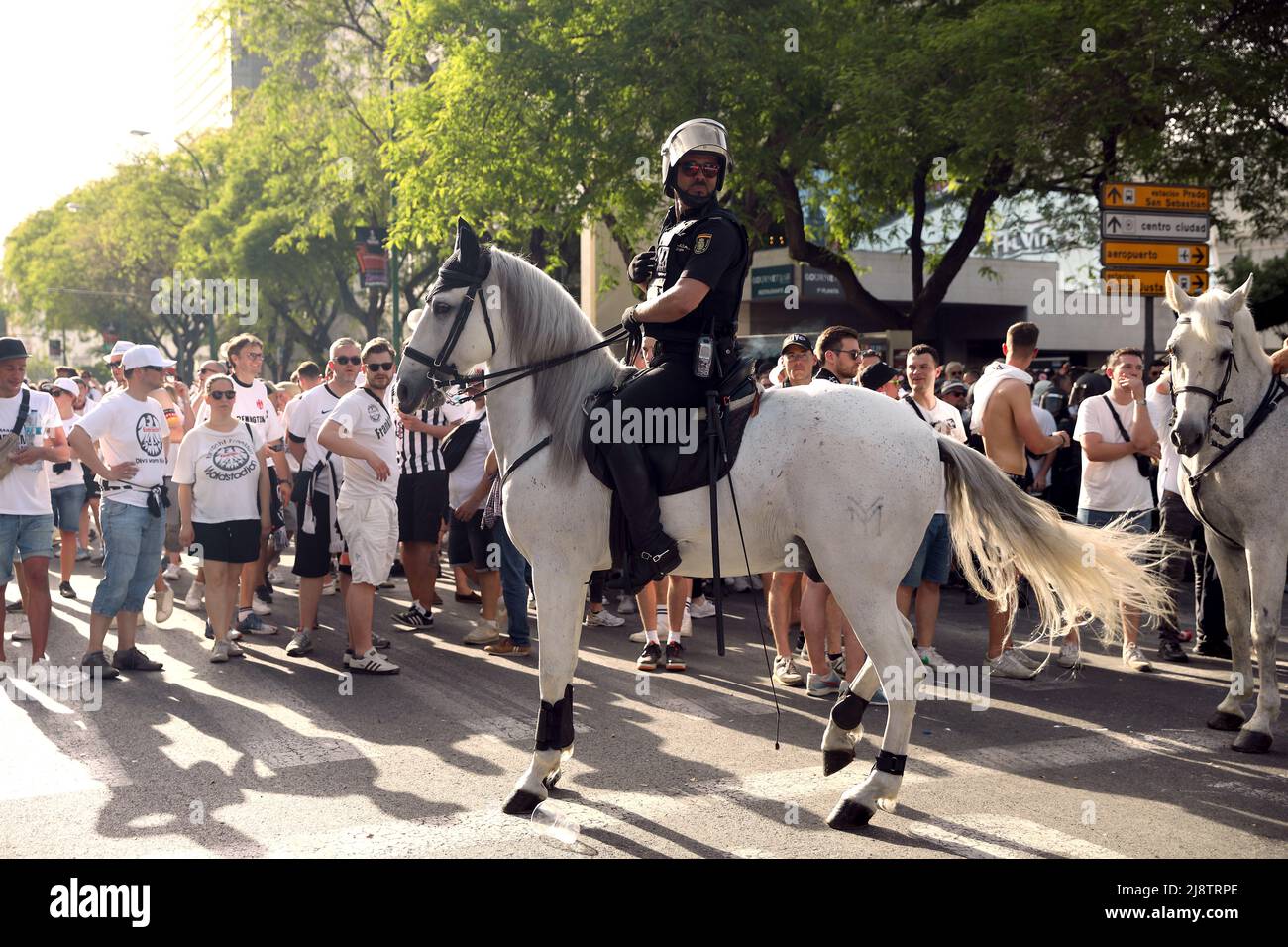 Mounted Police presence and fans outside the ground ahead of the UEFA Europa League Final at the Estadio Ramon Sanchez-Pizjuan, Seville. Picture date: Wednesday May 18, 2022. Stock Photo