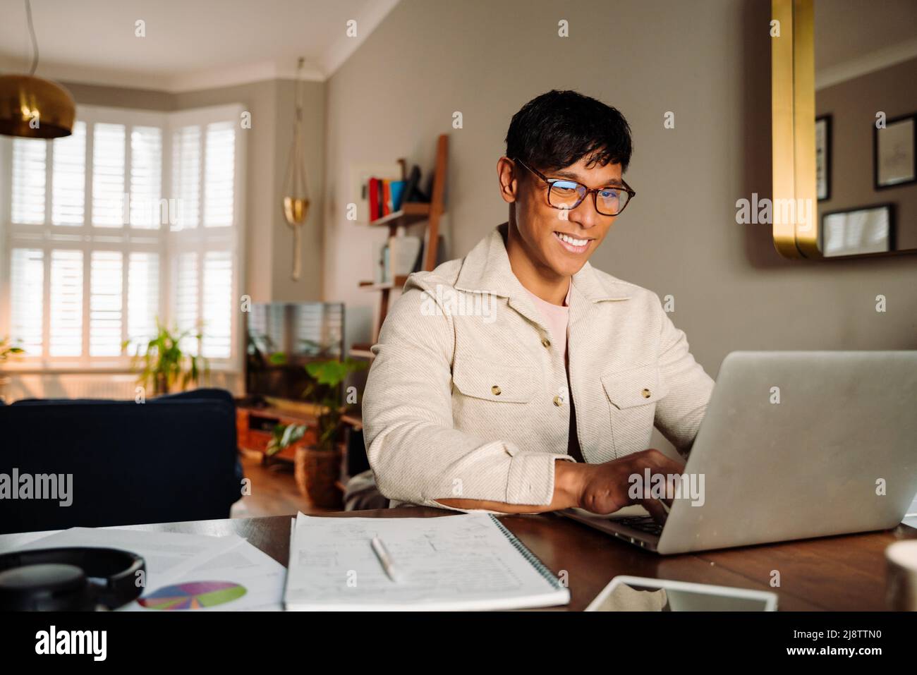 Young Asian man working online Stock Photo