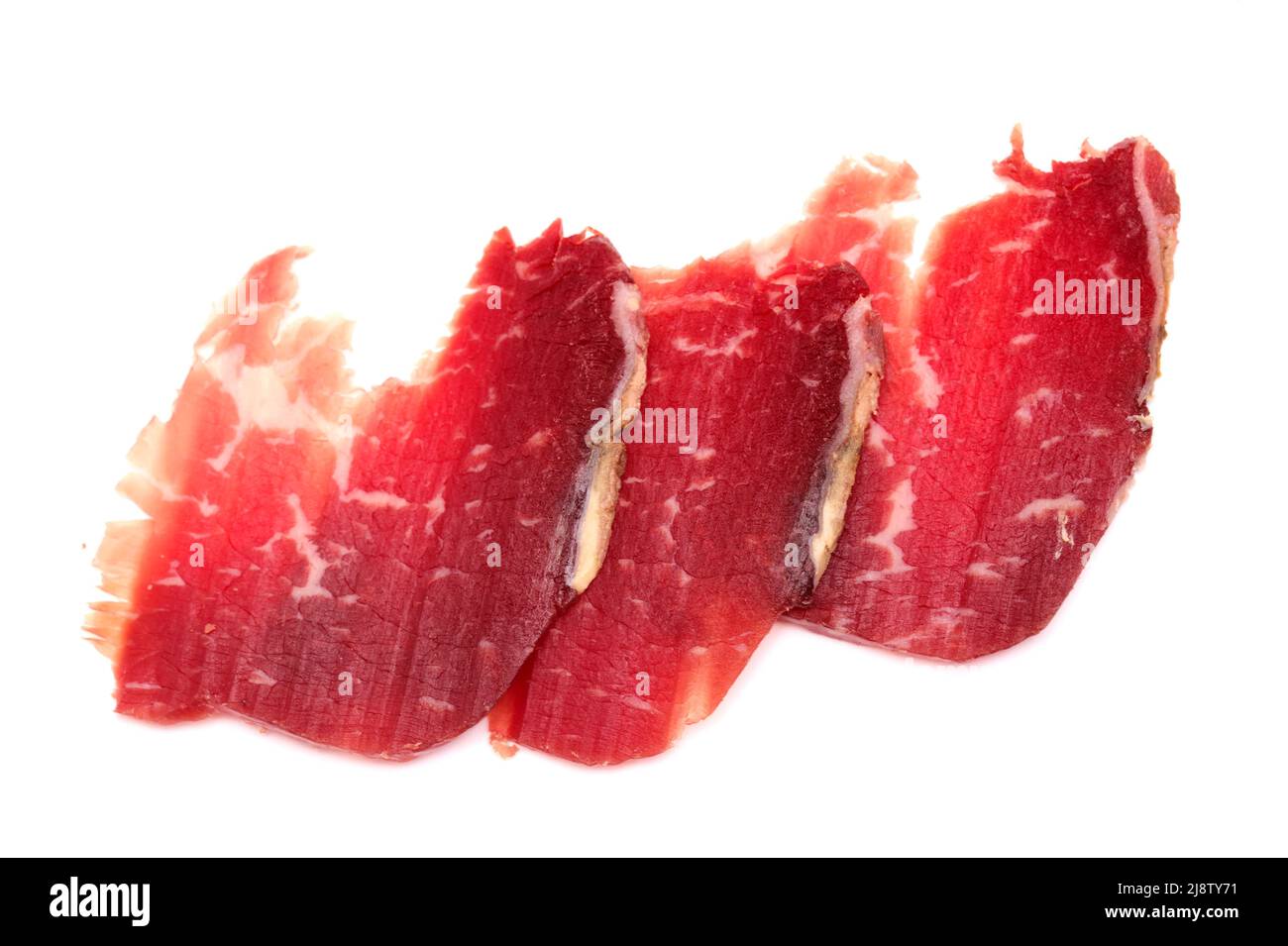 A piece of cecina from Leon (air dried and smoked cured beef made from the  hind leg of cattle from León, Spain Stock Photo - Alamy