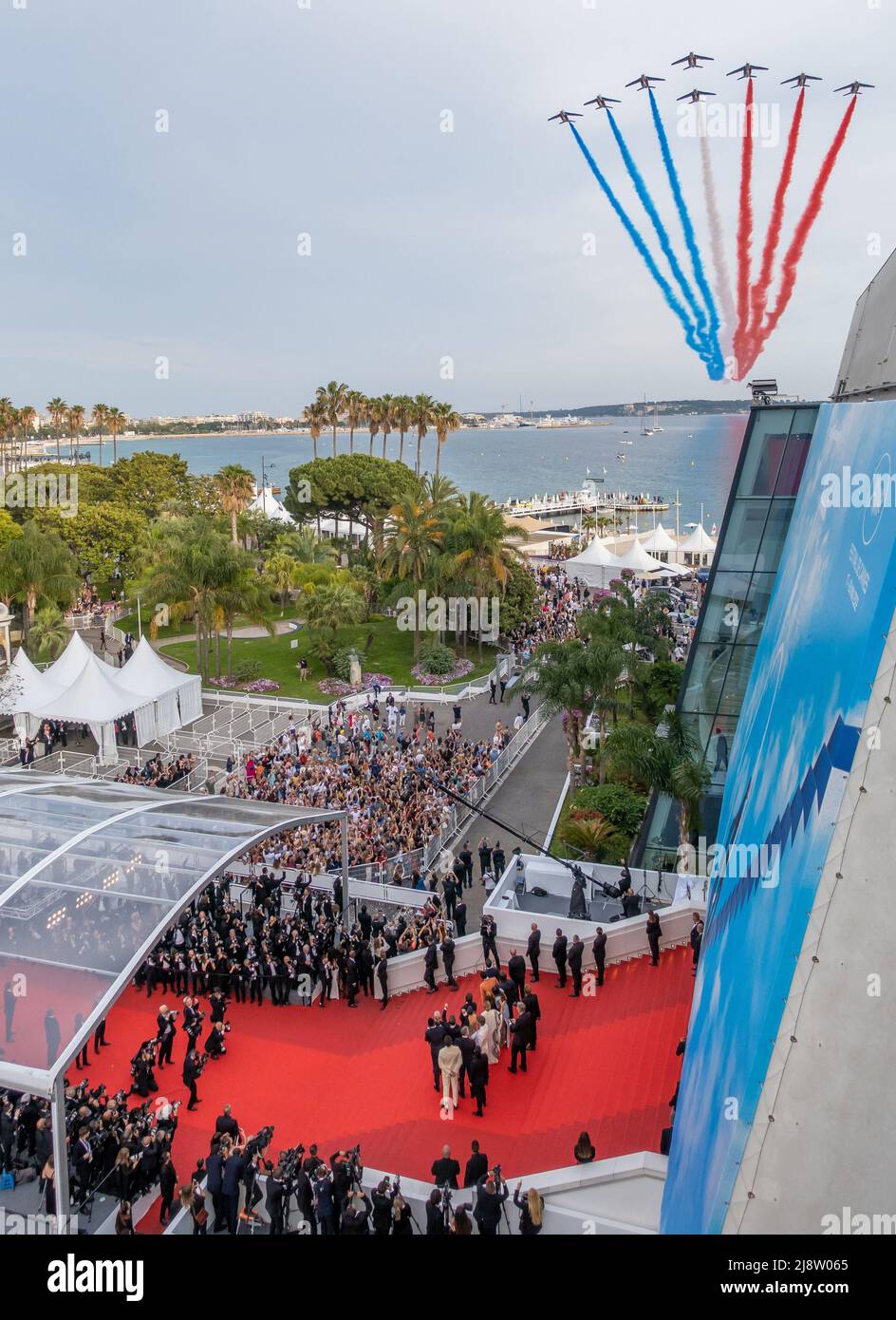 The Patrouille de France flying over the Palais des Festivals watched