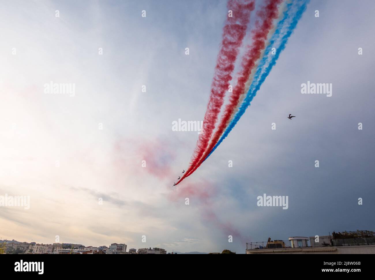 The Patrouille de France flying over the Palais des Festivals watched