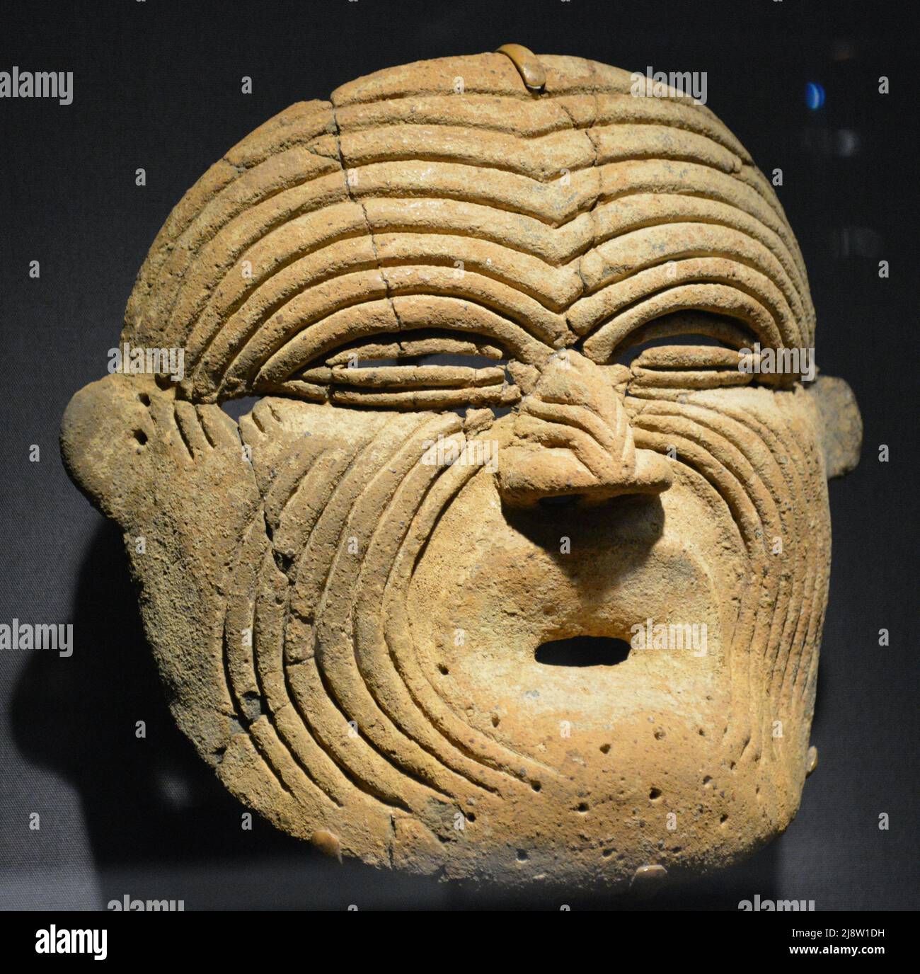 Precolumbian Masks, Funeral Mask from Calima Colombia Stock Photo - Alamy