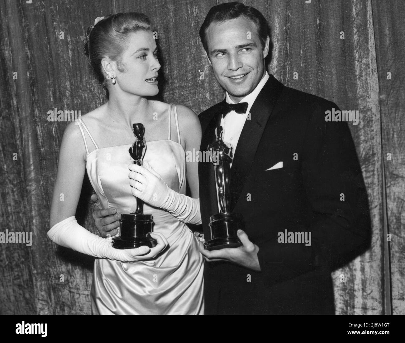 Grace Kelly, Marlon Brando, 27th Academy Awards 1955. File Reference 34145782THA Stock