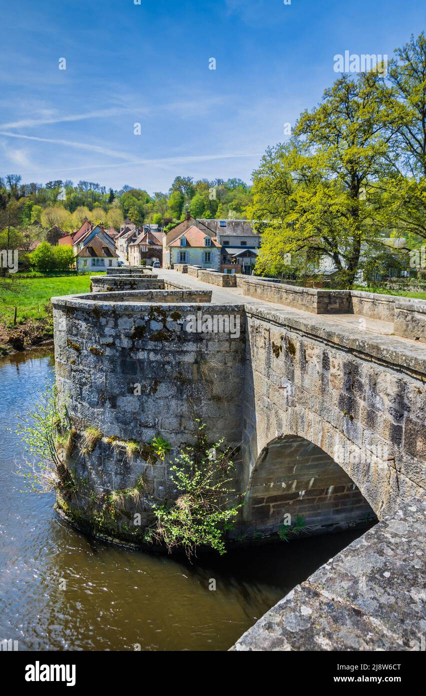 Narrow stone-built 'Roman Bridge' across the river Creuse at Moutier d ...