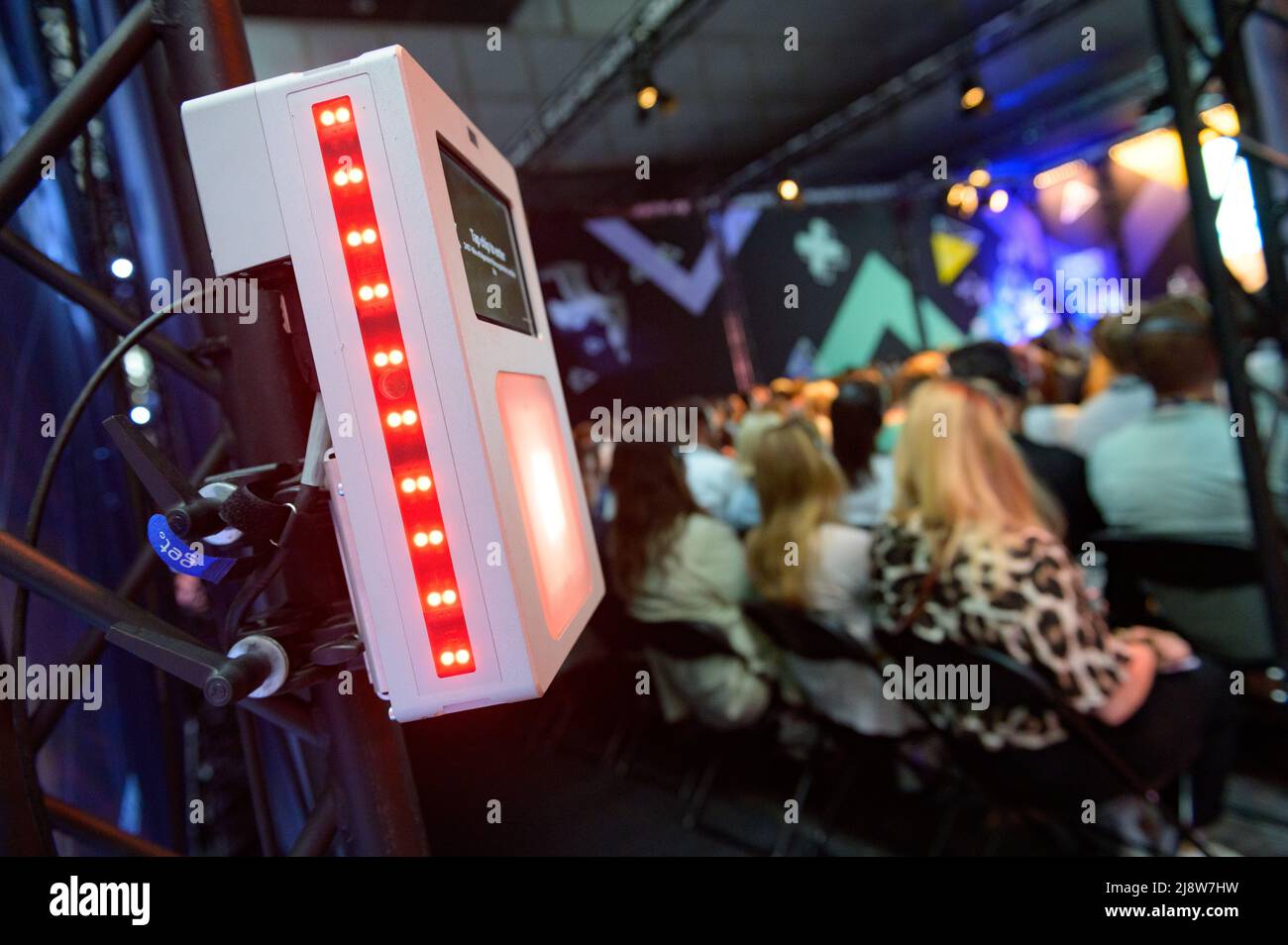 Hamburg, Germany. 17th May, 2022. A device for checking in and registering participants hangs at the entrance to a masterclass room. The OMR digital festival in Hamburg kicked off on Tuesday to great crowds and long lines at the entrances. Credit: Jonas Walzberg/dpa/Alamy Live News Stock Photo