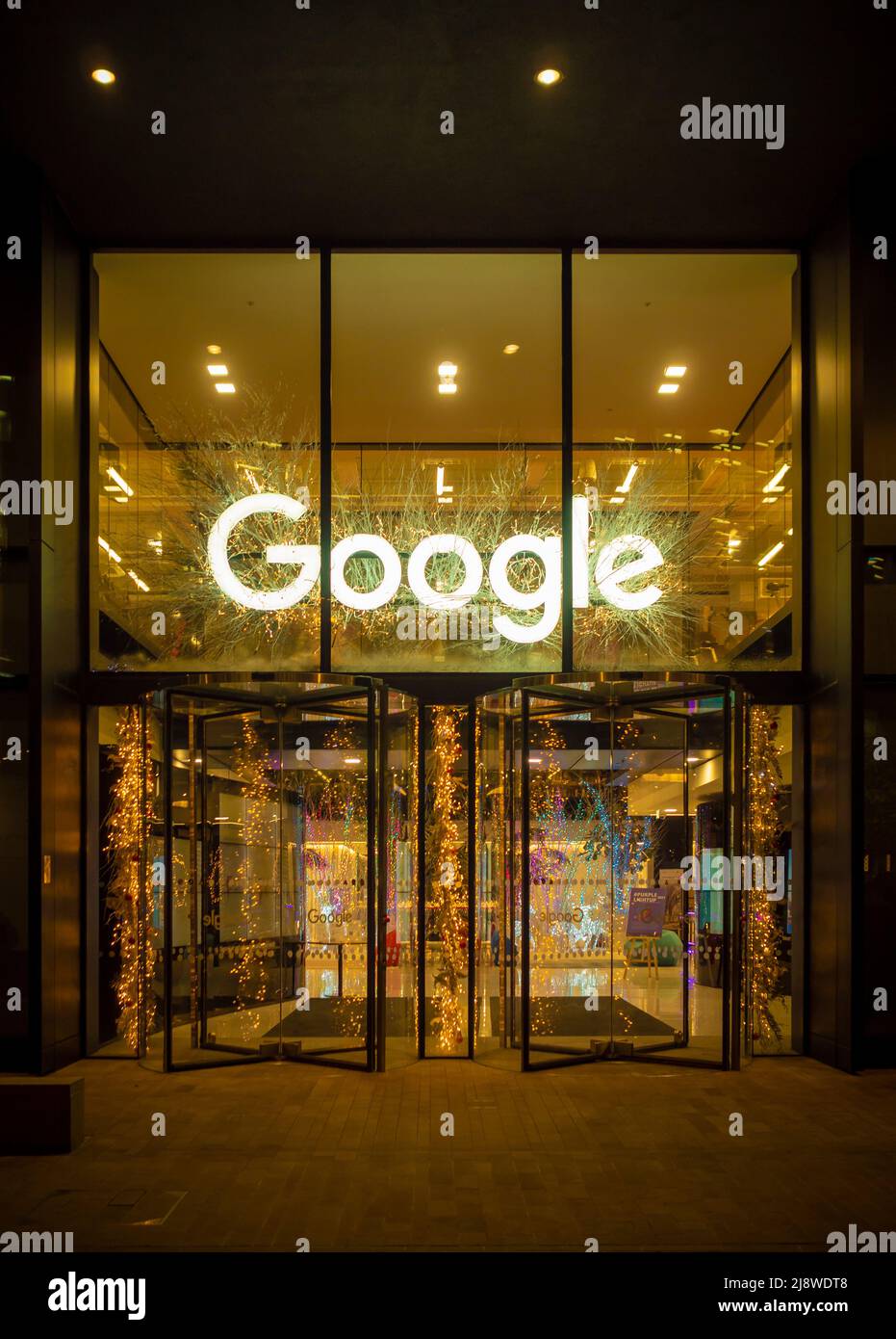 Google offices at night with Christmas decorations, Pancras Square, London, UK. Stock Photo