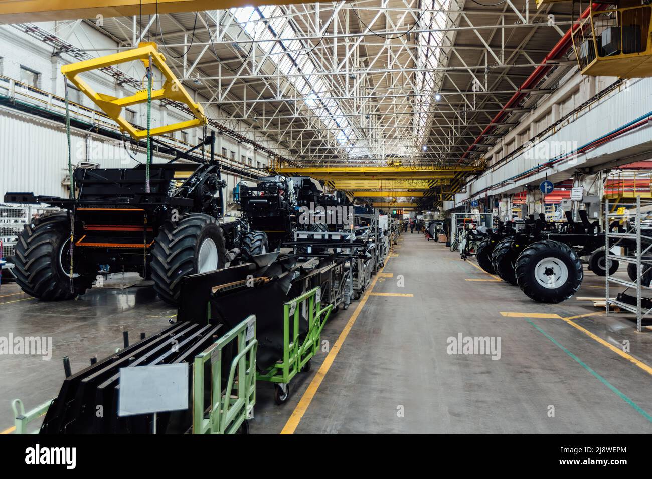 Assembly Design Tractor The process of assembling agricultural tractors and harvesters on the ...