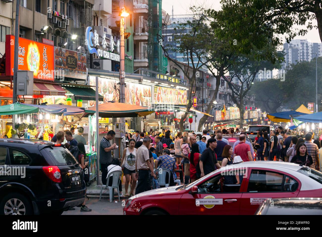 Kuala Lumpur; Malaysia - January 28; 2017: Street scene of Jalan Alor a popular food and eatinig area at night located in Bukit Bintang area of Kuala Stock Photo