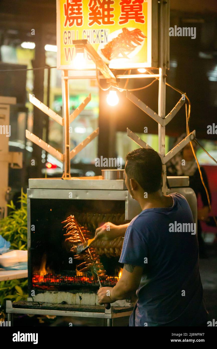 Kuala Lumpur; Malaysia - January 28; 2017: Street scene of Jalan Alor a popular food and eatinig area at night located in Bukit Bintang area of Kuala Stock Photo