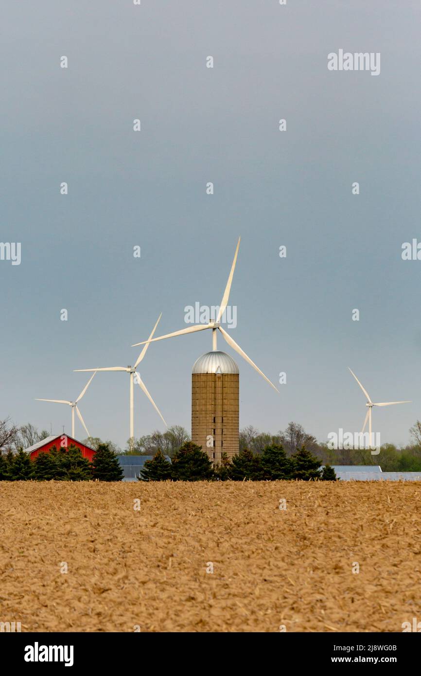 Port Austin, Michigan - Wind turbines, part of the Deerfield wind farm, on farm land in the Thumb of Michigan. Stock Photo