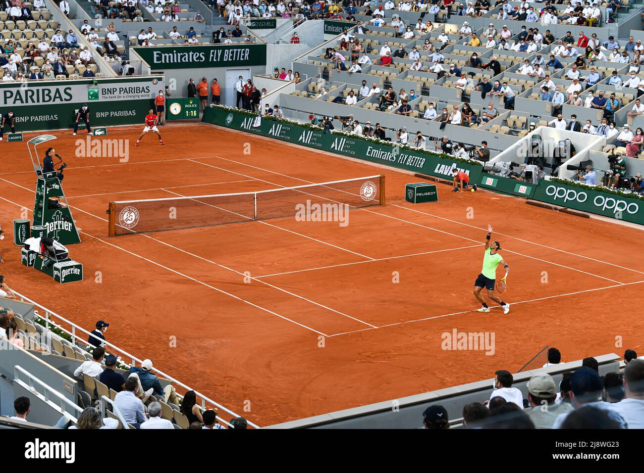 General view of center court with Rafael Nadal serving and Novak Djokovic during the semifinal at Roland-Garros (French Open), Grand Slam tennis tourn Stock Photo