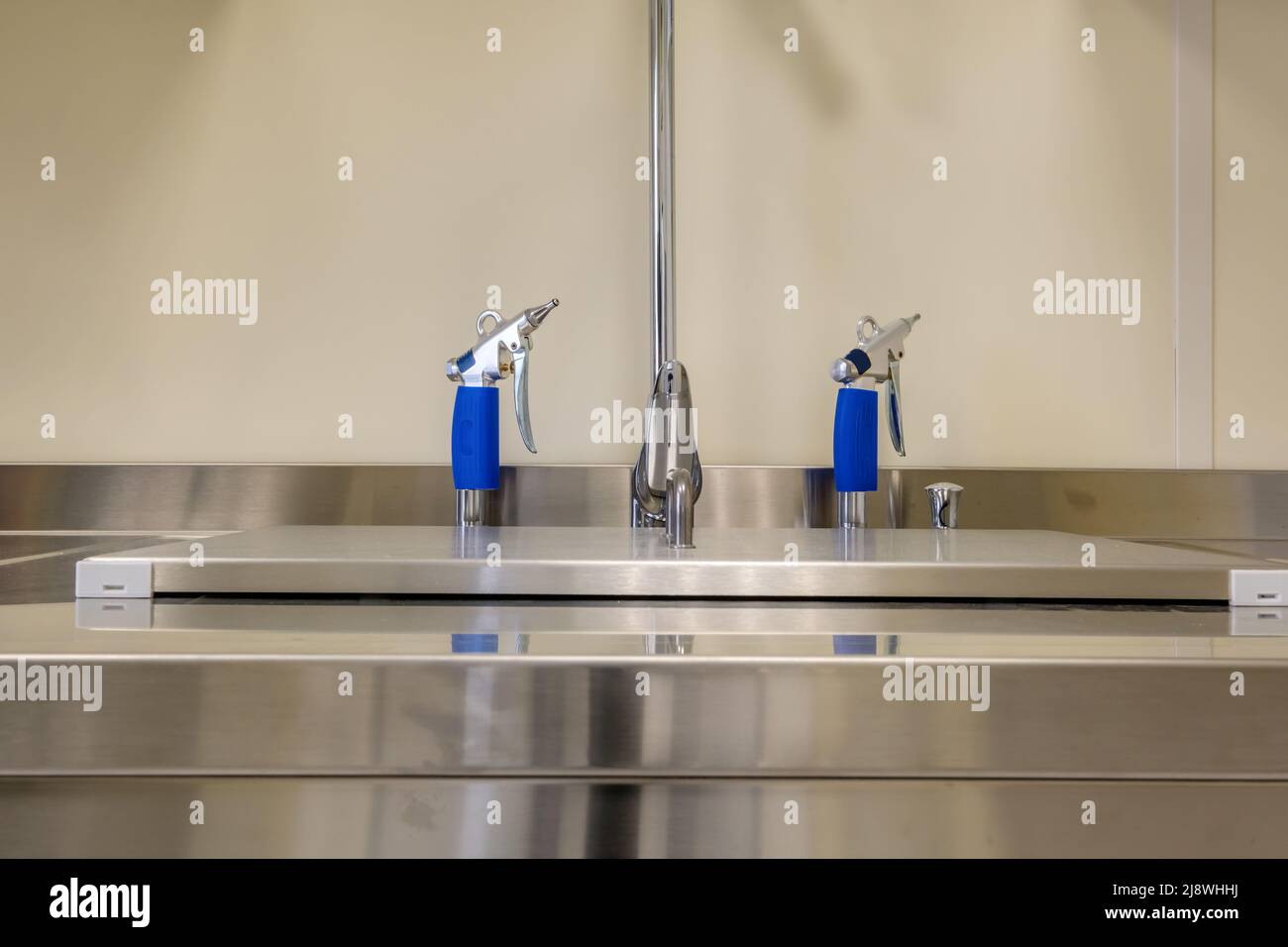 elbow soap and antiseptic dispenser or sanitizer wall mounted for hand