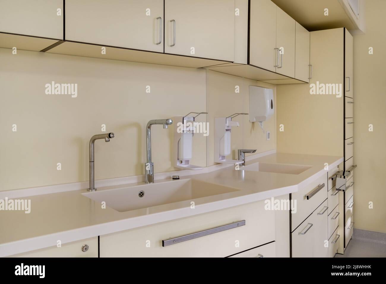 elbow soap and antiseptic dispenser or sanitizer wall mounted for hand