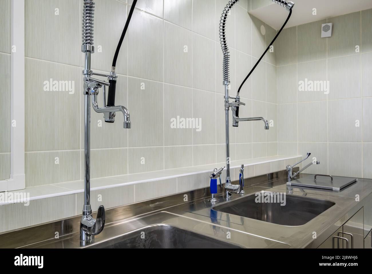 elbow soap and antiseptic dispenser or sanitizer wall mounted for hand