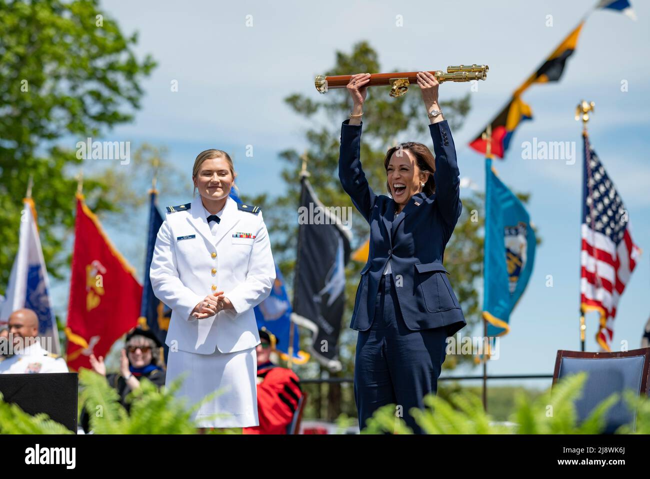 New London, United States of America. 18 May, 2022. U.S. Vice President Kamala Harris, lifts the school scepter over her head to mark the end of the 141st Commencement ceremony at the Coast Guard Academy, May 18, 2022 in New London, Connecticut. The Coast Guard Academy graduated 252 new officers along with nine international students. Credit: PO3 Matthew Thieme/U.S. Coast Guard Photo/Alamy Live News Stock Photo