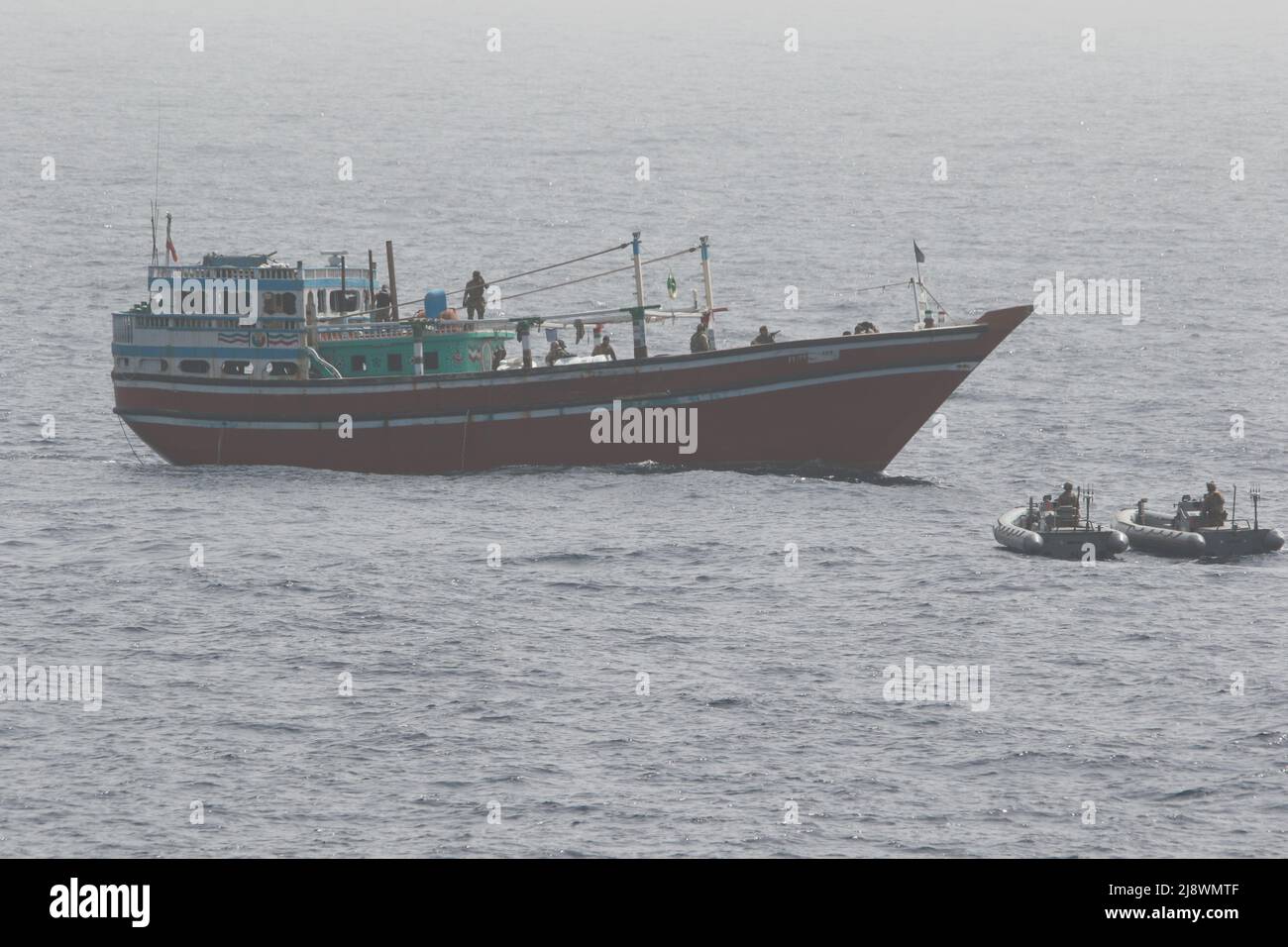 Gulf Of Oman, International Waters. 16th May, 2022. Gulf of Oman, International Waters. 16 May, 2022. A U.S. Navy interdiction team from the guided-missile destroyer USS Momsen boards a fishing vessel carrying illegal narcotics, May 16, 2022 in the Gulf of Oman. The vessel was smuggling $39 million dollars of illegal methamphetamine. Credit: MC3 Lily Gebauer/USCG/Alamy Live News Stock Photo