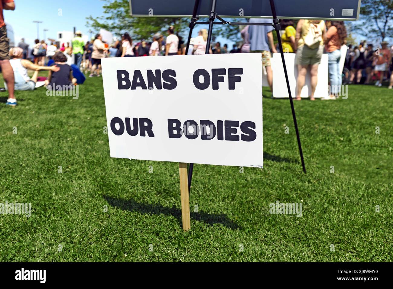 A sign states 'Bans Off Our Bodies' in Cleveland, Ohio Willard Park during the May 14, 2022, rally for US Abortion Rights. Stock Photo