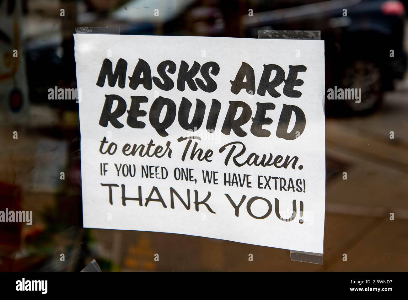 Lawrence, Kansas. Lawrence, Kansas. Facemasks are required sign in shop after the government lifted the mask requirement. Stock Photo