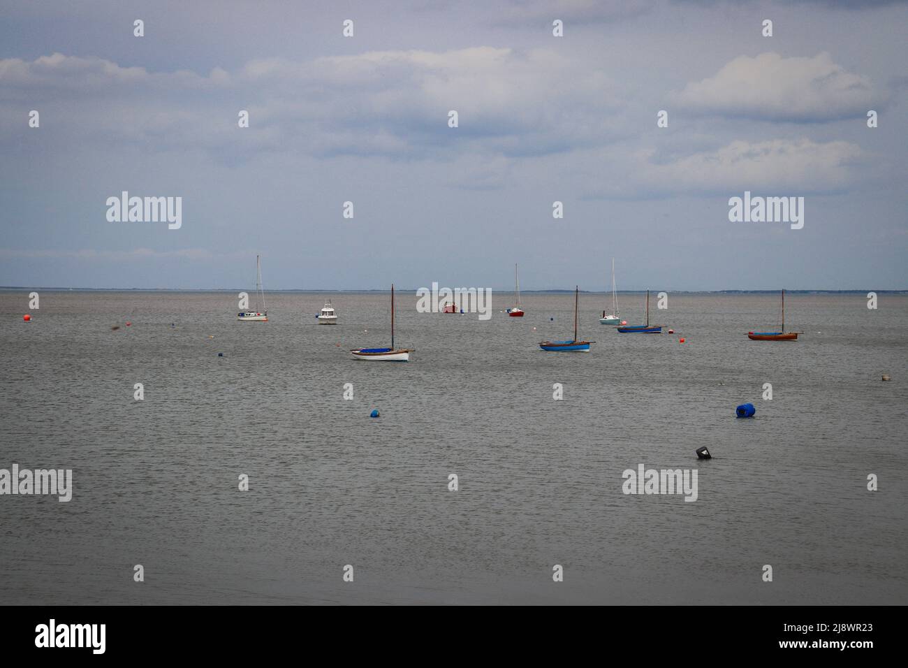Sail boats out on the Irish Sea at Meols, Wirral Stock Photo