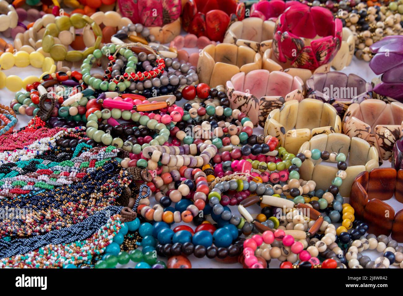 Ecuador, Quito. Otavalo market. Typical souvenir tagua jewelry Stock