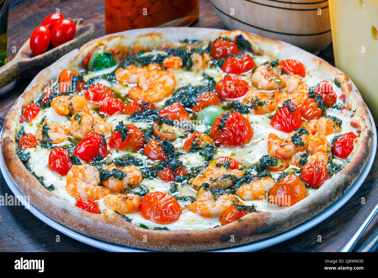 Seafood pizza baked in a woodfired oven Stock Photo Alamy