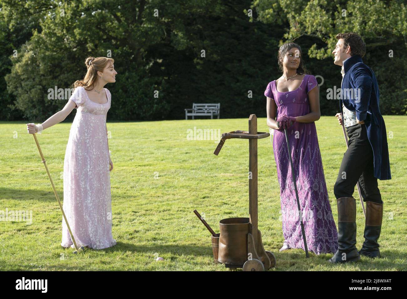 BRIDGERTON, from left Phoebe Dynevor, Simone Ashley, Jonathan Bailey