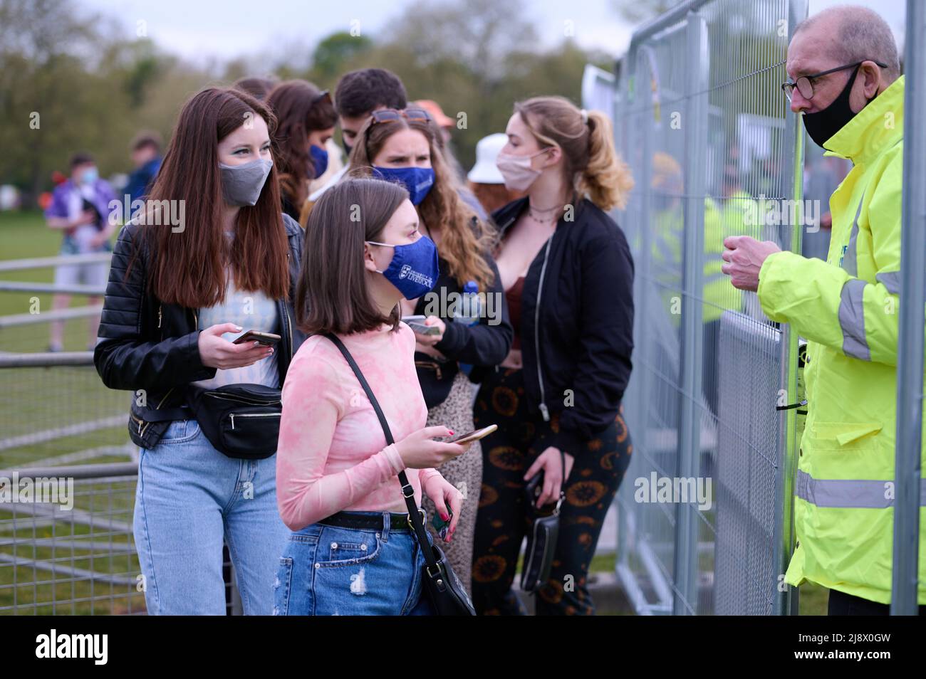 Music fans arrive for the first non-socially distanced gig at Sefton Park in Liverpool on May 2, 2021. The gig is headlined by Manchester indie band Blossoms. The gig was a test pilot event by the Government for the return of live music events this Summer. Featuring: Atmosphere Where: Liverpool, United Kingdom When: 02 May 2021 Credit: Graham Finney/WENN Stock Photo