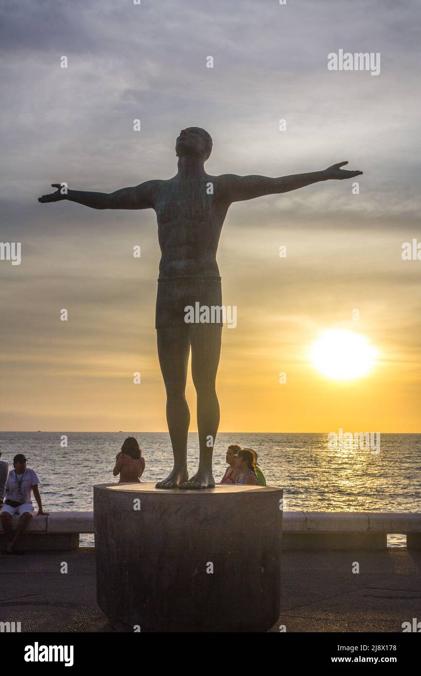 Statue of man with arms outstretched Stock Photo Alamy